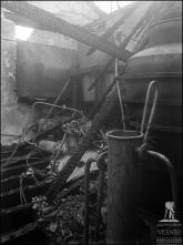 Destroços do incêndio na destilaria da Fábrica do Torreão, de W. Hinton & Sons, Freguesia de Santa Luzia, Concelho do Funchal  